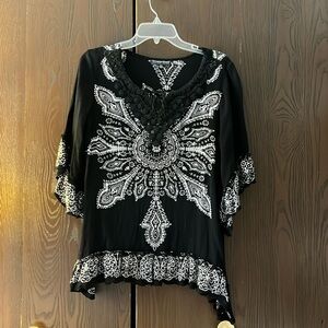Greater Good Boho sleeved black top. Size S/M